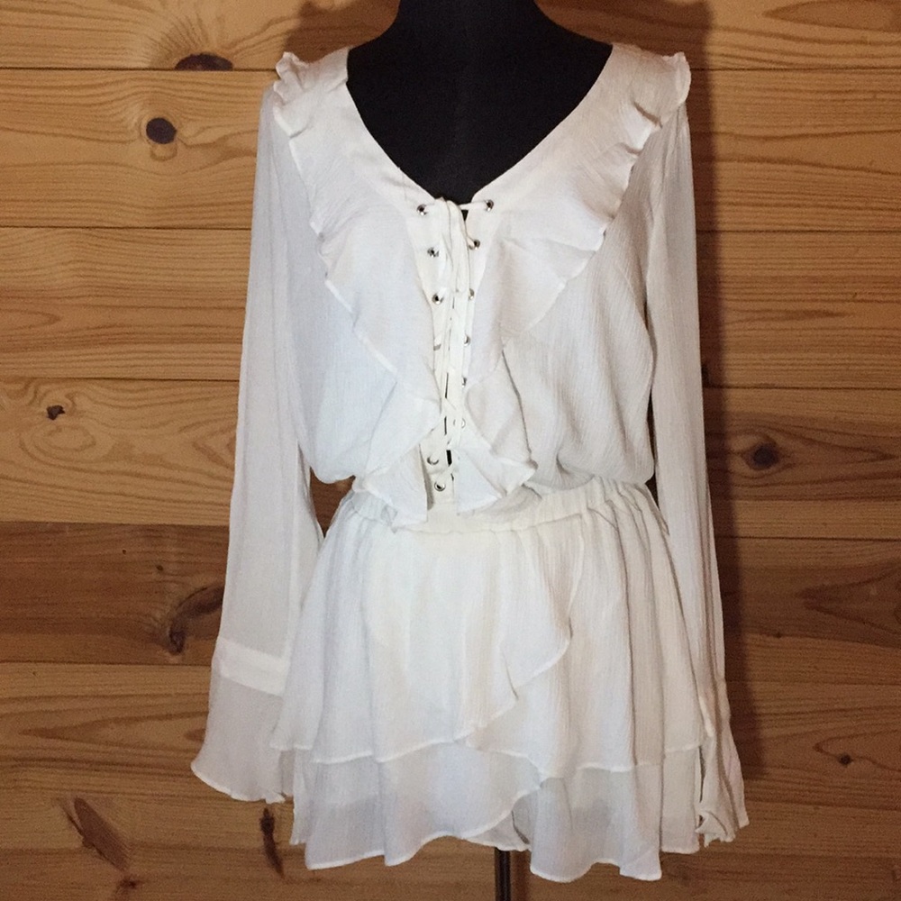 White flowing lace up blouse